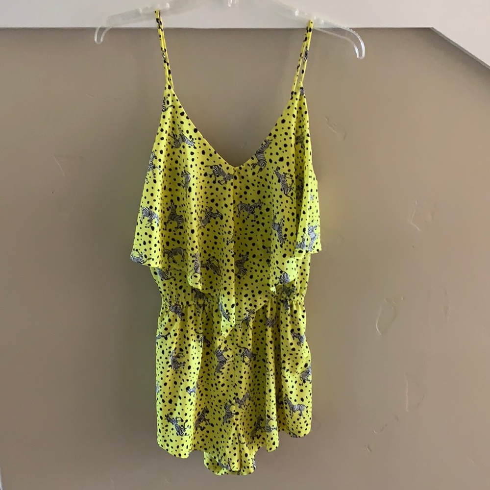 Yellow romper with zebras and black polka dot